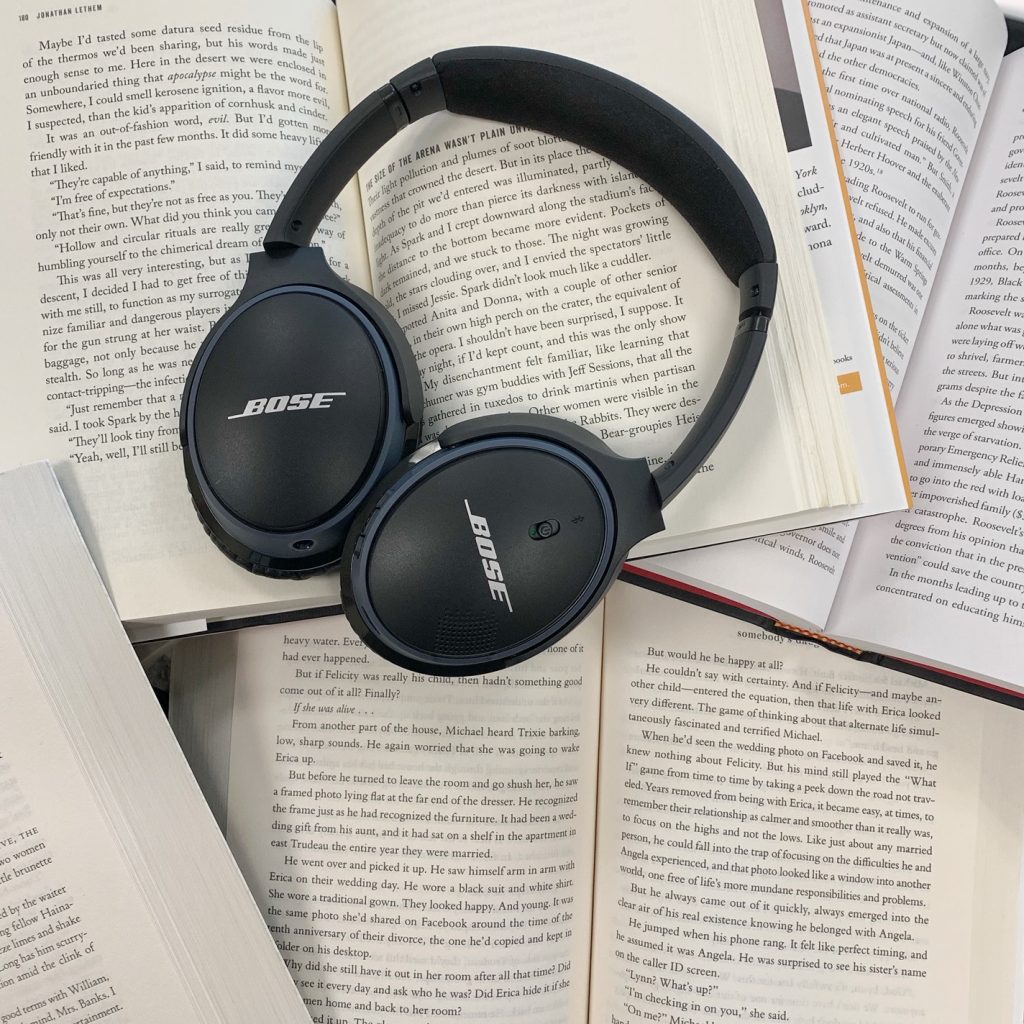 headphones on books