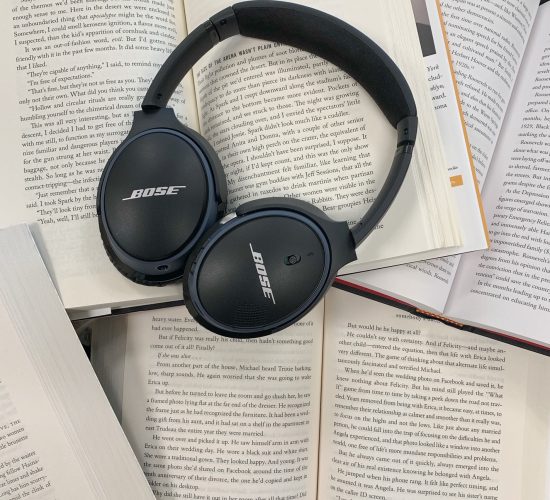headphones on books