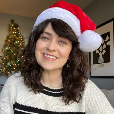 carrie rollwagen wearing a santa hat