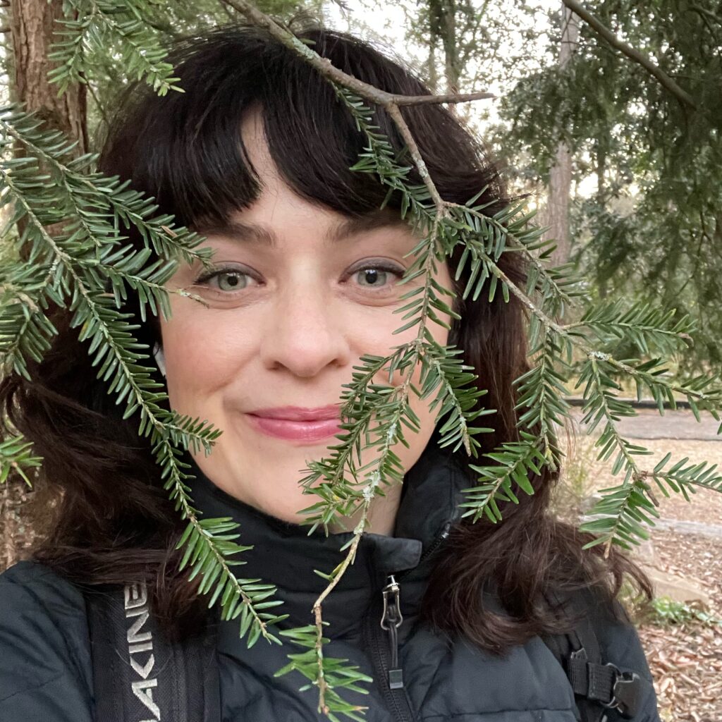 carrie rollwagen with a christmas tree
