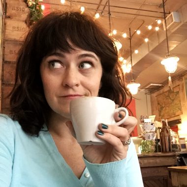 girl drinking coffee at urban standard