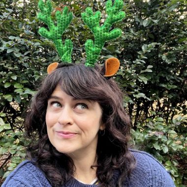 carrie rollwagen wears reindeer antlers